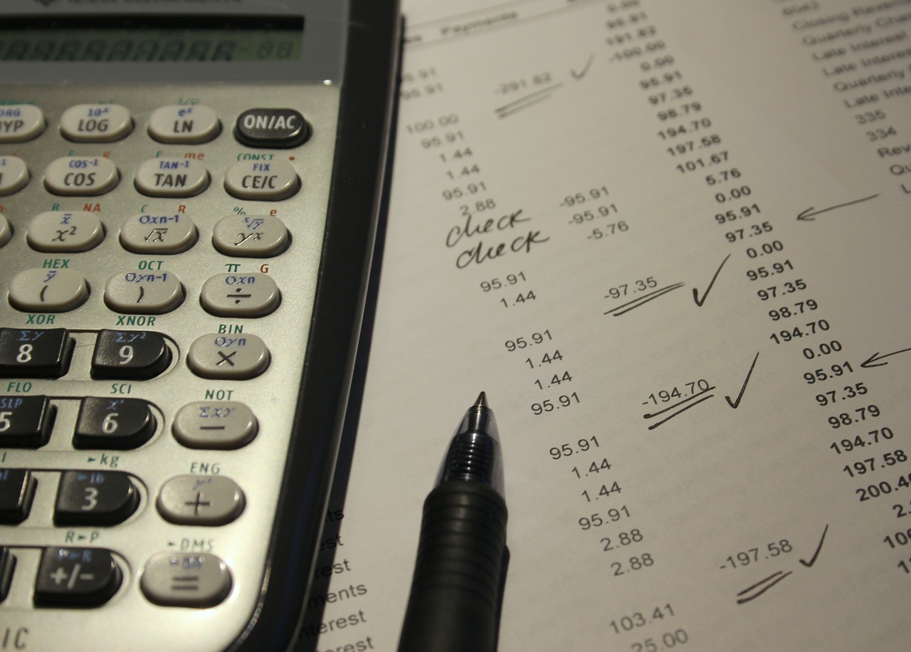 calculator pen and paper